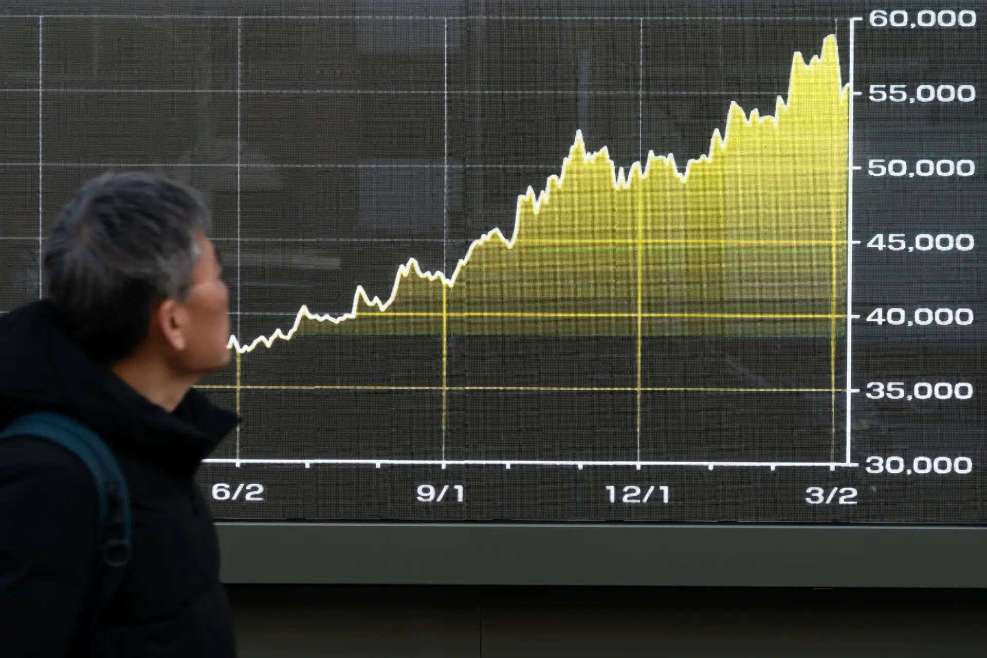 Japan bond outflows surge as oil prices raise inflation worries