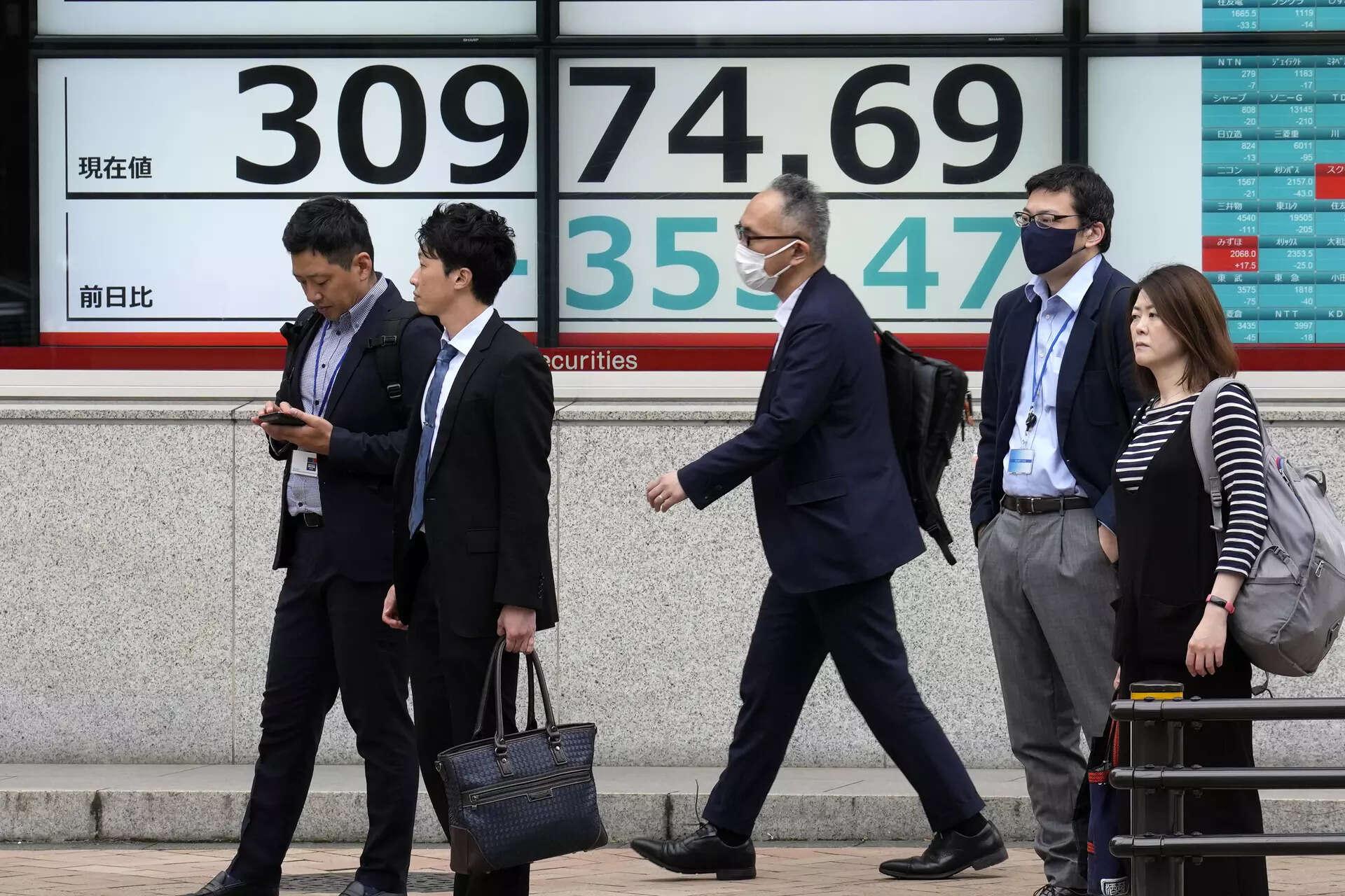 Global Market Today: Asian stocks track Wall Street lower on US CPI