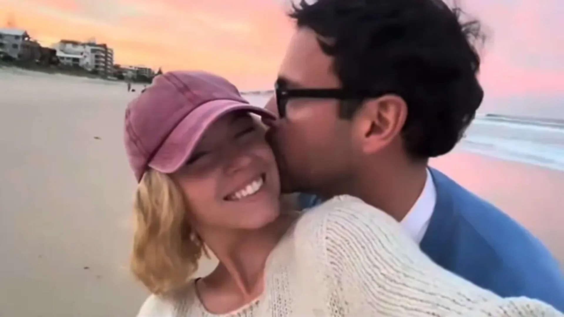 Sydney shares PDA-filled clip with Scooter - WATCH
