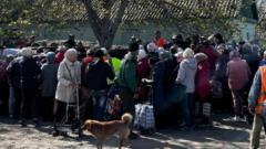 To stay or risk the 'Road of Death' - Ukrainian civilians trapped in frontline city