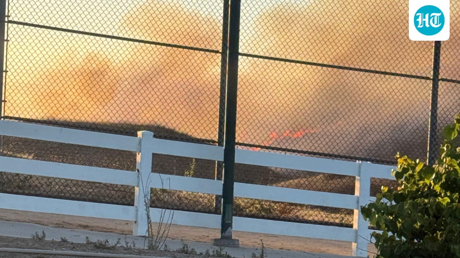Tesla crash sparks massive California wildfire, threatening hundreds of homes in Chino Hills