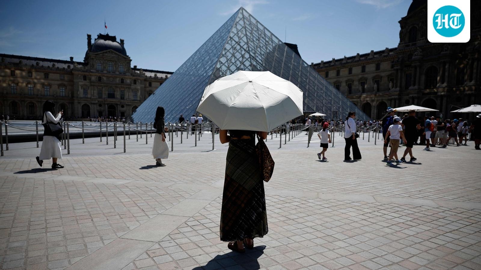 Paris pride parade postponed following intense heatwave and threats to ban
